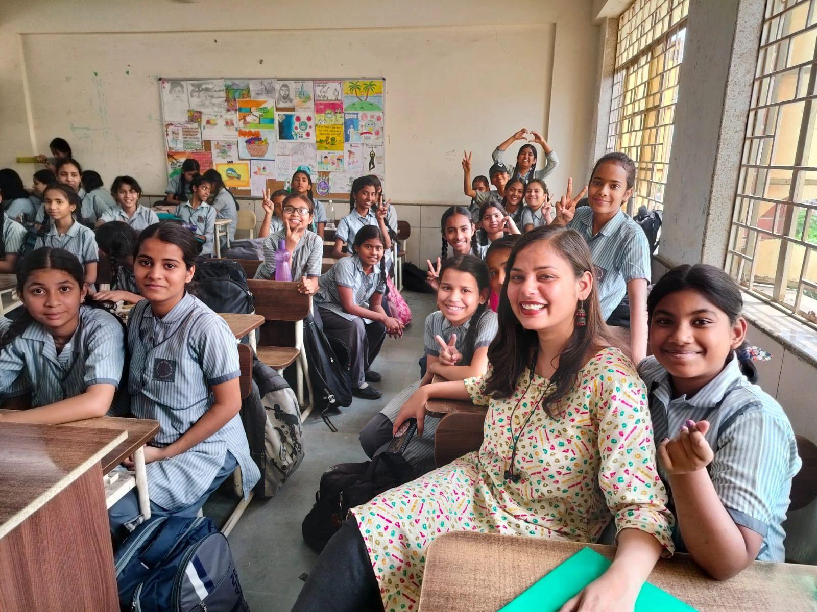 Sheetal with a class of schoolgirls during a workshop